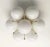 Italian flush mount with seven glossy white Murano glass globes mounted on solid brass frame in lacquered polished brass...