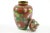 Early 20th Century Chinese Cloisonne Vase w/ top Red with white, blue and green flowers. Cloisonne is an ancient technique...
