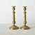 Exceptional pair of French mid-late 19th century brass candlesticks aligning with Empire tastes, these appear as miniature...