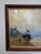 This antique 1917 watercolor painting attributed to Thomas J. Caparn captures a quiet harbor scene with moored boats and...