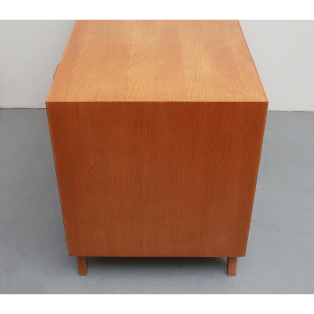 50s Lady Desk. On the right with a container with 4 drawers with brass handles. Above it is an excerpt with a resopal...