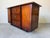 Striking vintage buffet/credenza crafted in rich mahogany, blending Art Deco elegance with Asian-inspired design elements....