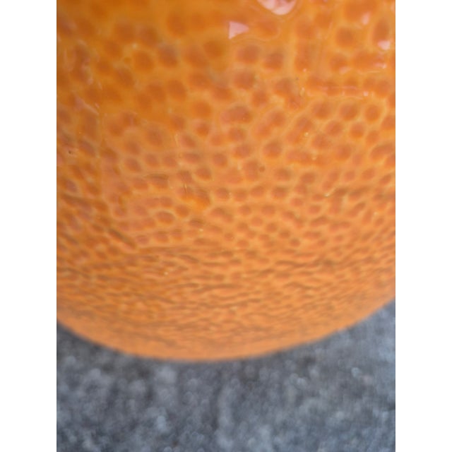 Whimsical Mid-Century Italian garden seat in the form of a orange decorated in realistic vibrant colors.