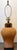 Vintage terracotta table lamp. It features a distinct relief design—a raised decorative pattern—consisting of a floral...