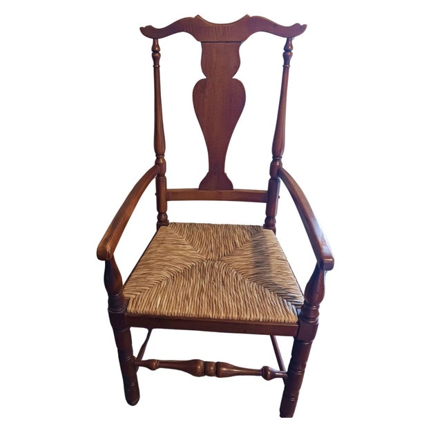 This early 20th century vintage fiddle back armchair exudes timeless elegance and charm. Crafted with exquisite attention...