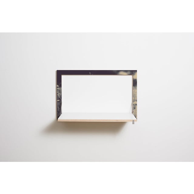 Wall art, workstation functional and discreet, this fläpps wall desk makes the perfect seated or standing workstation...