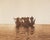 A photogravure restrike after a photograph by American photographer Edward Curtis (1868-1952). Titled "Masked Dancers in...