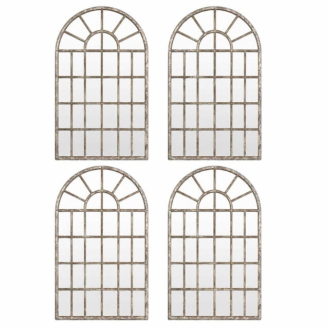 This cohesive set features four small, distinctively shaped vintage wall mirrors, designed in an arched, cathedral window-...