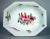 A wonderfully whimsical pair of Chelsea porcelain octagonal dishes, hand-painted around 1758-60 with tumbling arrangements...