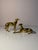 A dynamic duo: This two-piece set of brass greyhounds brings majestic grace and timeless elegance to your home. The pair...