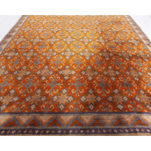 Vintage Swedish Pile Rug Size: 9'10" × 11'1" (299 × 337 cm) Color: Beige, Blue, Brown, Orange Exuding warmth, charm, and...