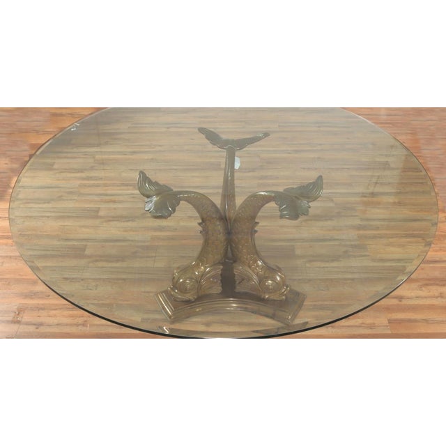 I guess this would be considered a grotto style dining table. The piece of glass on top is just over six feet wide and is...