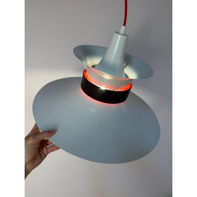 A true showstopper of scandinavian lighting design: this black and white slatted lamp, designed in the 1970s by bent...