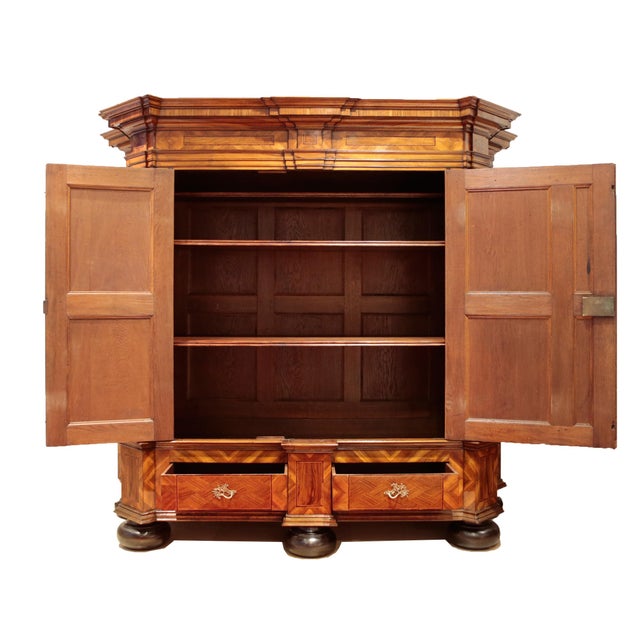 Hall cupboard from the Budde cabinetry in Warendorf, Westphalia, circa 1770, walnut and plum veneer on oak, elaborate...