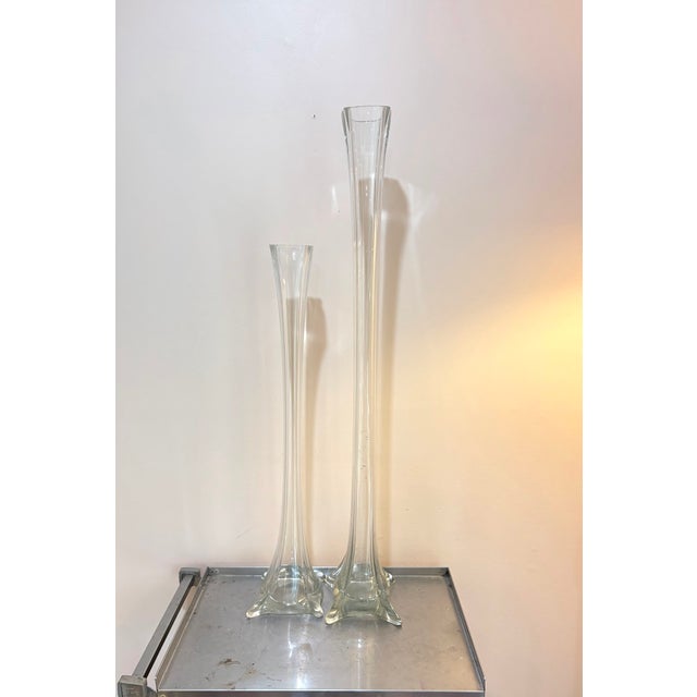 Dramatically tall Murano-style glass vases; set of two. One vase has some mild scuffing near base on one side, as shown in...
