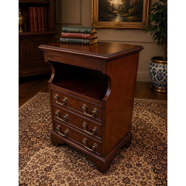 An elegant and highly versatile mahogany bedside or occasional cabinet, combining attractive traditional styling with an...