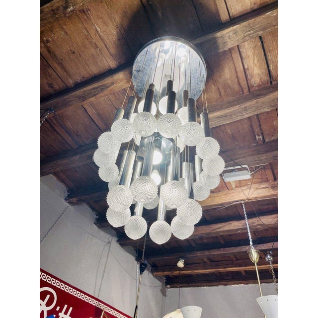 Extremely rare pendant lamp designed by Gaetano Sciolari for the company of the same name, a symbol of Italian and...