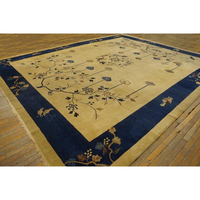 Antique Chinese - Peking Room Size Wool Ivory Rug, Circa Date: 1920s. This exceptional example of early 20th-century...