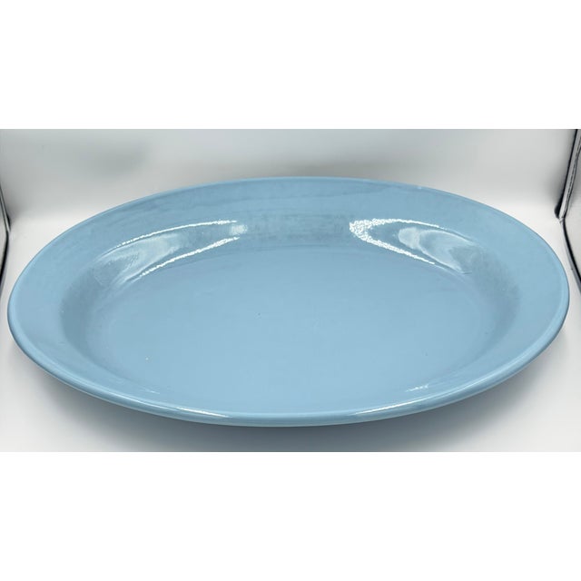 This exquisite piece of vintage dinnerware measures a generous 19 inches, making it perfect for serving a delightful array...