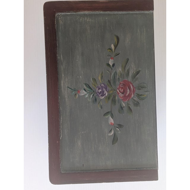 A one of a kind 1960s handcrafted wood jewelry box with a sweet hand painted floral design. Has a lidded hinged top and...
