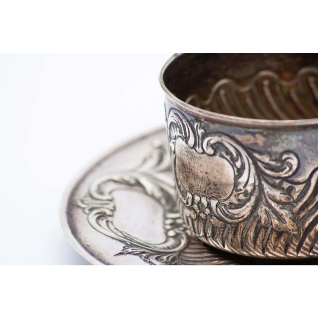 Silver Relief Cup and Saucer with Geometric Figures and Monogram Card, Set of 2, in Very Good conditions. Designed 1890 to...