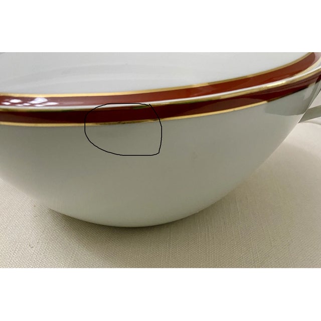 Elevate your table with this elegant C.P. Limoges France Soup Tureen by Charles Paroutaud, featuring a rich red ground...