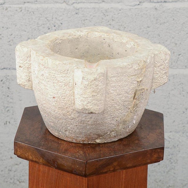 This antique circular stone mortar, dating back to the 19th century, is an authentic testament to the rural traditions and...
