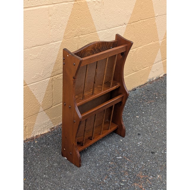 This authentic vintage Mid-Century Modern wall-mounted rack offers a sophisticated solution for organizing your home...