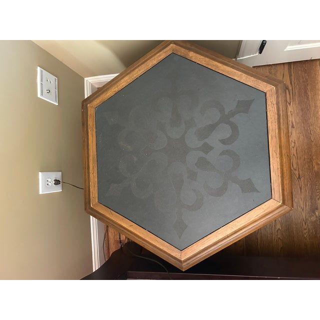 Unique and stylish side table or coffee table. The table is very heavy. It is definitely a vintage piece but not 100% sure...