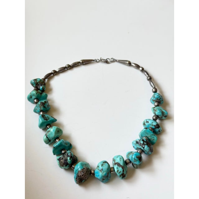 Stunning Native American (most likely Navajo) necklace. Large chunks of natural turquoise spaced with silver, Navajo...