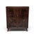 A vintage two-door storage cabinet with dramatic, mirror-matched flame-pattern mahogany veneers. Framed door panels, a...
