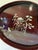 Chairish Description: This oval wooden tray is finished in a rich reddish-brown lacquer, inlaid with mother of pearl...