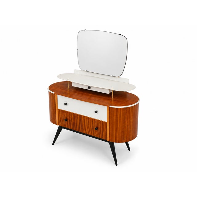 A striking and beautifully restored Harris Lebus Link dressing table, dating from the late 1950s and showcasing the...