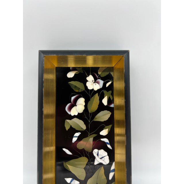 Italian, 19th century. A fine quality Italian marble Pietra Dura plaque showcasing beautiful white calla lily flowers and...