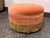 Design Plus Gallery presents the Yolanda Ottoman from Jennifer Taylor Home. Upholstered in peach-orange velvet, the...