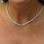 Natural 3-carat graduated diamond tennis necklace in platinum 850 featuring thick bezel settings from 6mm to 3.5mm with...
