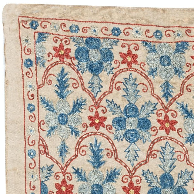 Celebrate the rich heritage of Asian craftsmanship with this exquisite 100% silk Suzani textile, meticulously hand-...