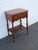 This delightful Nightstand Side End Table is made of wood, solid wood, and veneer. It was made by Berkey and Gay Furniture...