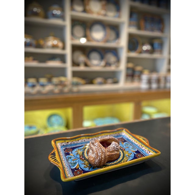 This vibrant Collectible Majolica Rectangular Tray B-64 can be used for food or decoration. As it will brightly accent a...
