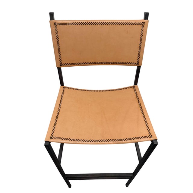 Quick Hits: - Sol Luna Tan Leather & Iron Bar Stool - Rich tan leather with sleek iron frame - Perfect height for bar...