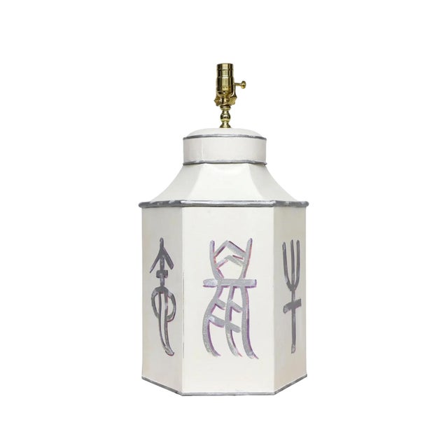 This late 20th-century hand-painted iron table lamp cleverly blends geometric shapes with calligraphic elegance. Based on...
