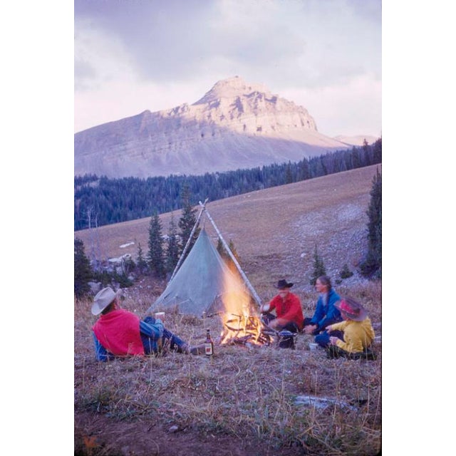 A Campfire On The Trail 1960 Holiday makers at a Wyoming dude ranch enjoy a campfire on the trail, USA, 1960. Toni...