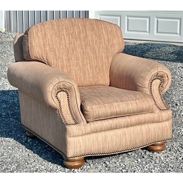 Classic English inspired club chair. This generously proportioned version is by Bradington Young. Featuring oversized set...