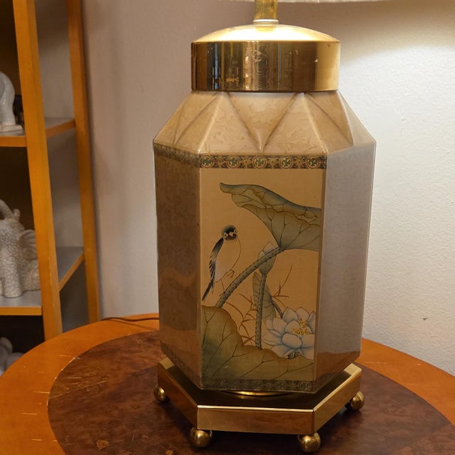 Add a touch of timeless Hollywood Regency elegance to your space with this stunning vintage Chinoiserie table lamp. The...