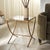 Invite a touch of glam and sophistication with our Debbie accent table. Our sleek and minimal accent table features a...