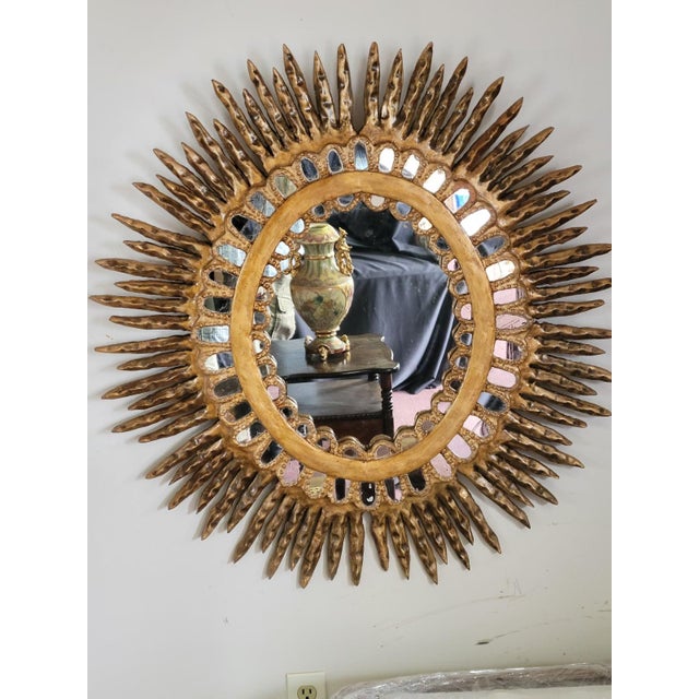 19th Century Italian Gilded Sunburst Mirror – Handcrafted Solid Wood An exceptional 19th-century Italian sunburst mirror,...