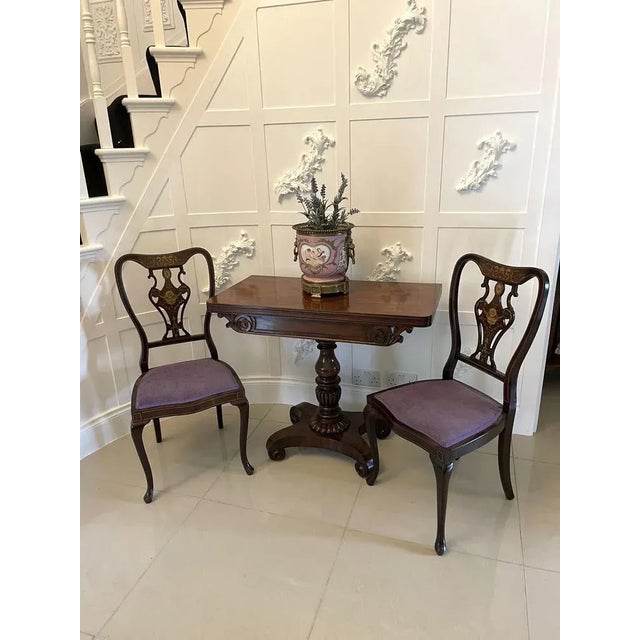 Antique William IV quality figured mahogany tea table having a quality figured mahogany fold over top opening to reveal a...