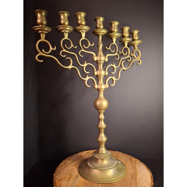 This is a monumental, solid-cast brass 7-branch synagogue/temple menorah, standing an impressive 21.5 inches tall and...
