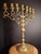 This is a monumental, solid-cast brass 7-branch synagogue/temple menorah, standing an impressive 21.5 inches tall and...