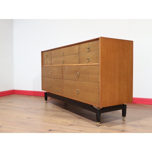 A beautiful large dresser made by renowned furniture maker G Plan, this Mid Century Modern Vintage Teak Dresser combines...